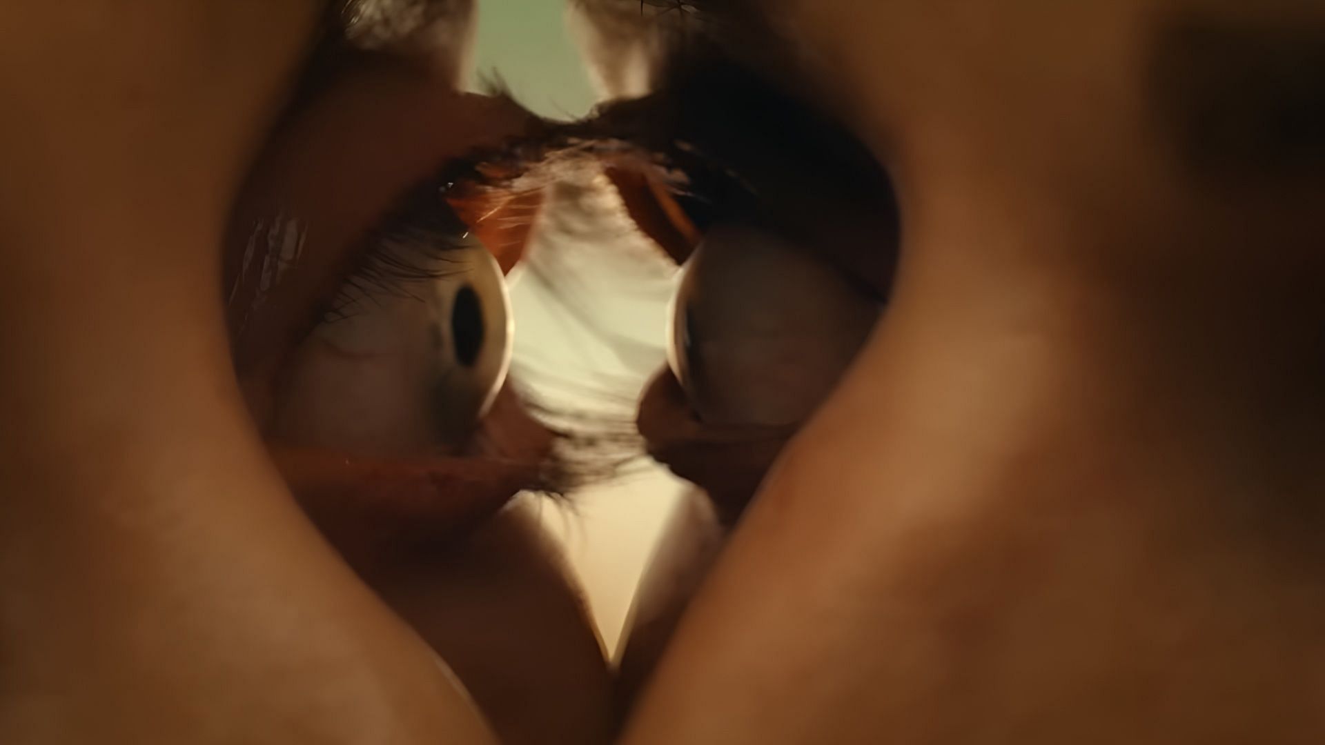 Together 2025 captures the collapse of boundaries with this surreal eye-to-eye moment. (Image via NEON)